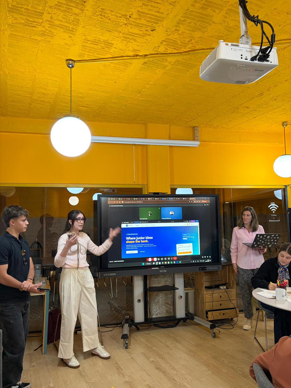 Students presenting their project at Impact Hub