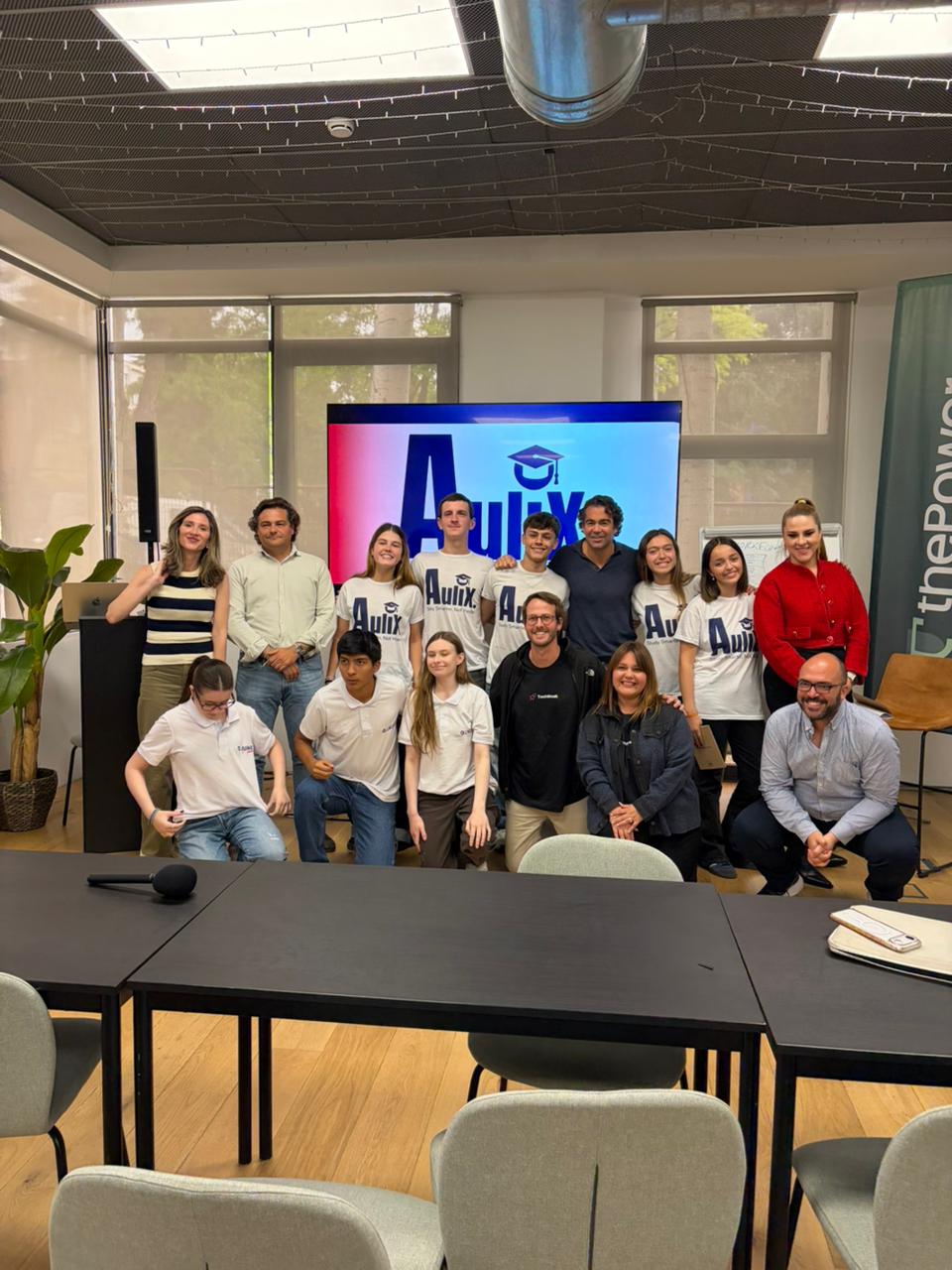 Full group photo with the Aulix team