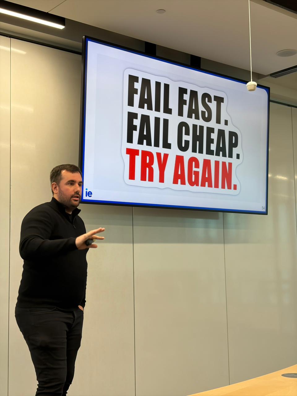 Speaker presenting Fail Fast, Fail Cheap, Try Again at IE